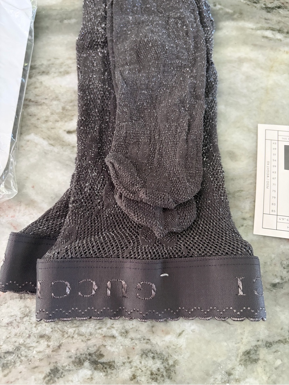 Gucci Women’s shimmer gray fishnet GG tights never worn